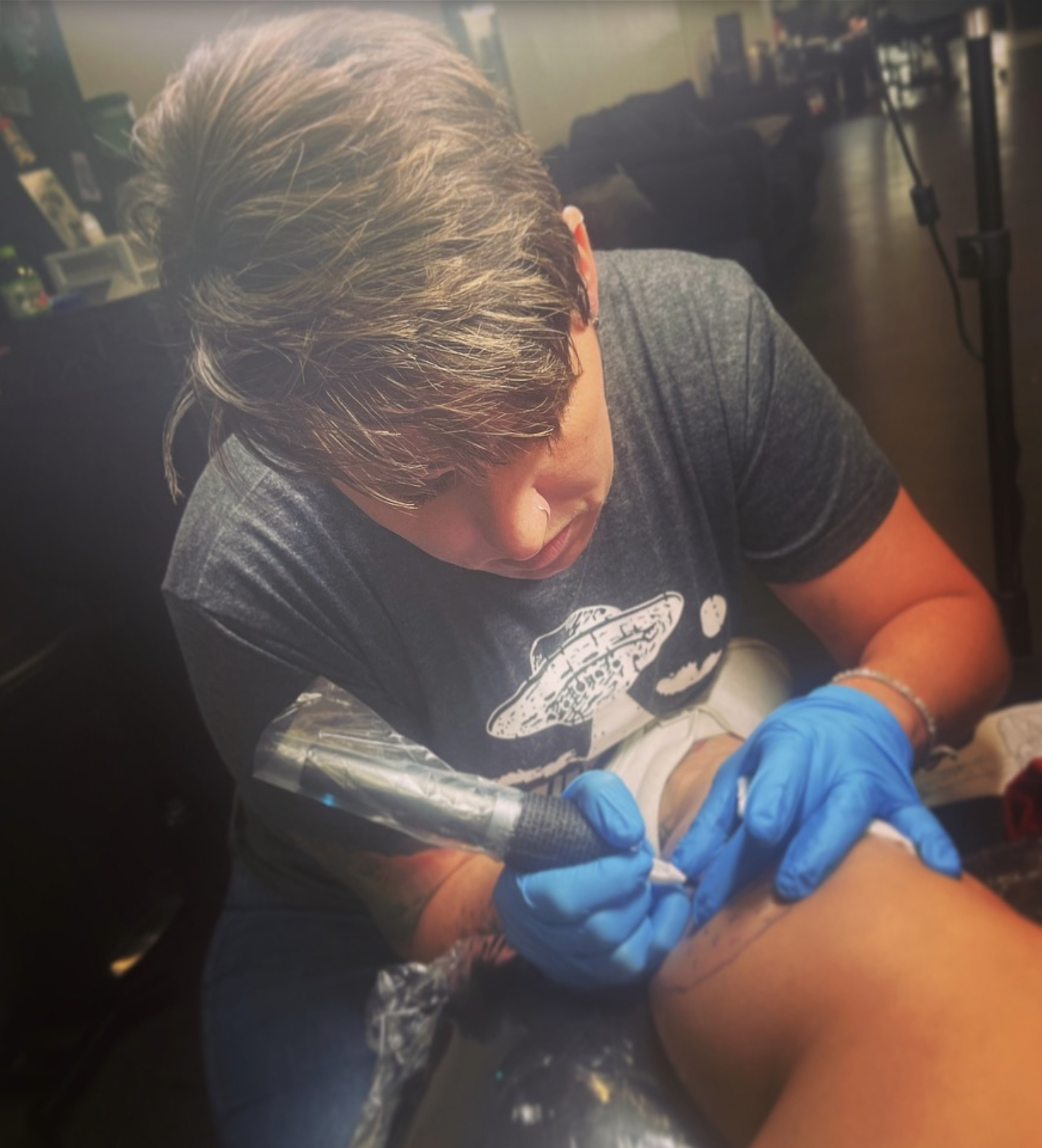 Kayla working on a website layout